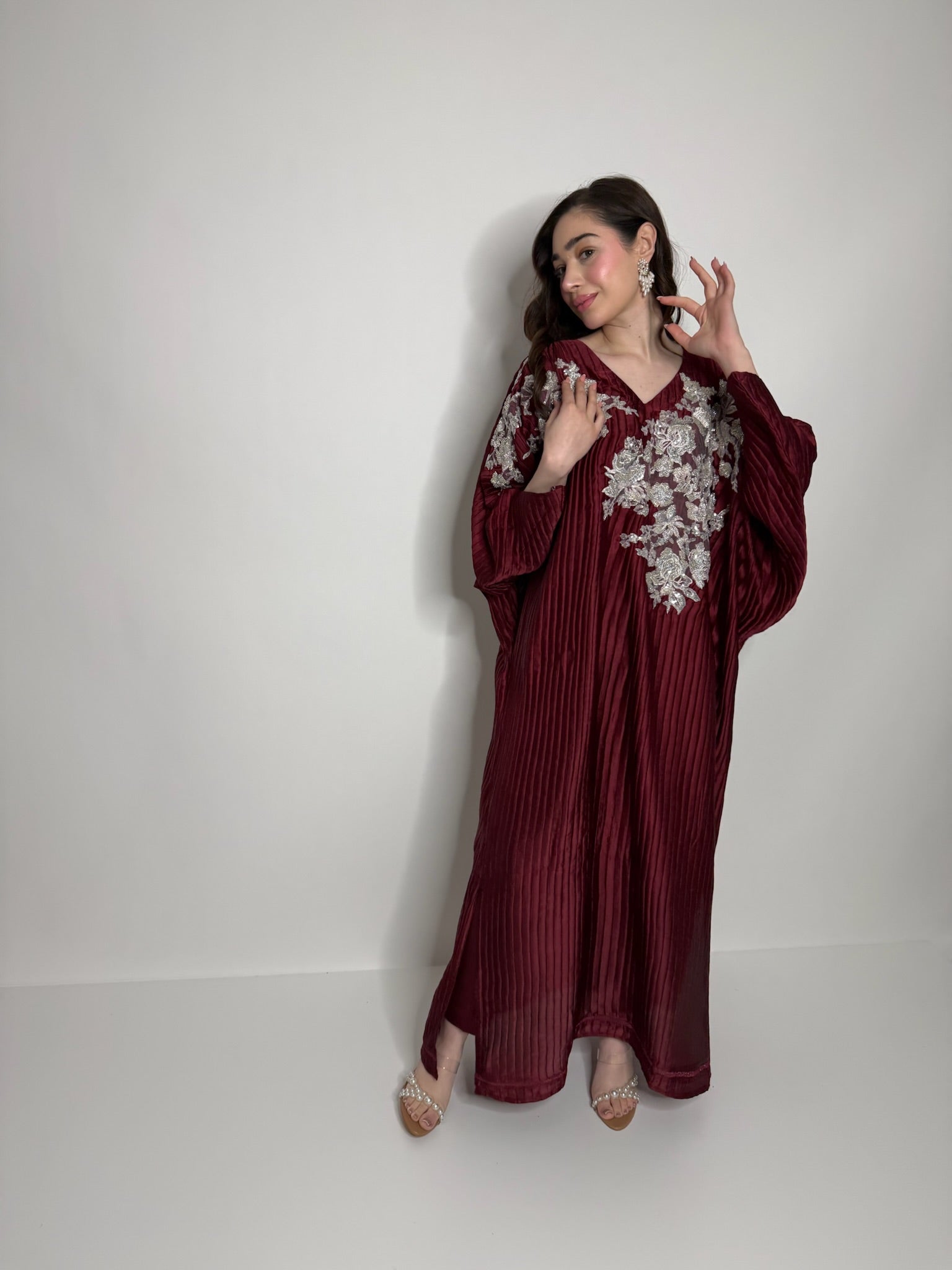 Silk trousers detail from Aurévia kaftan set, structured base for elegant modest outfit.
