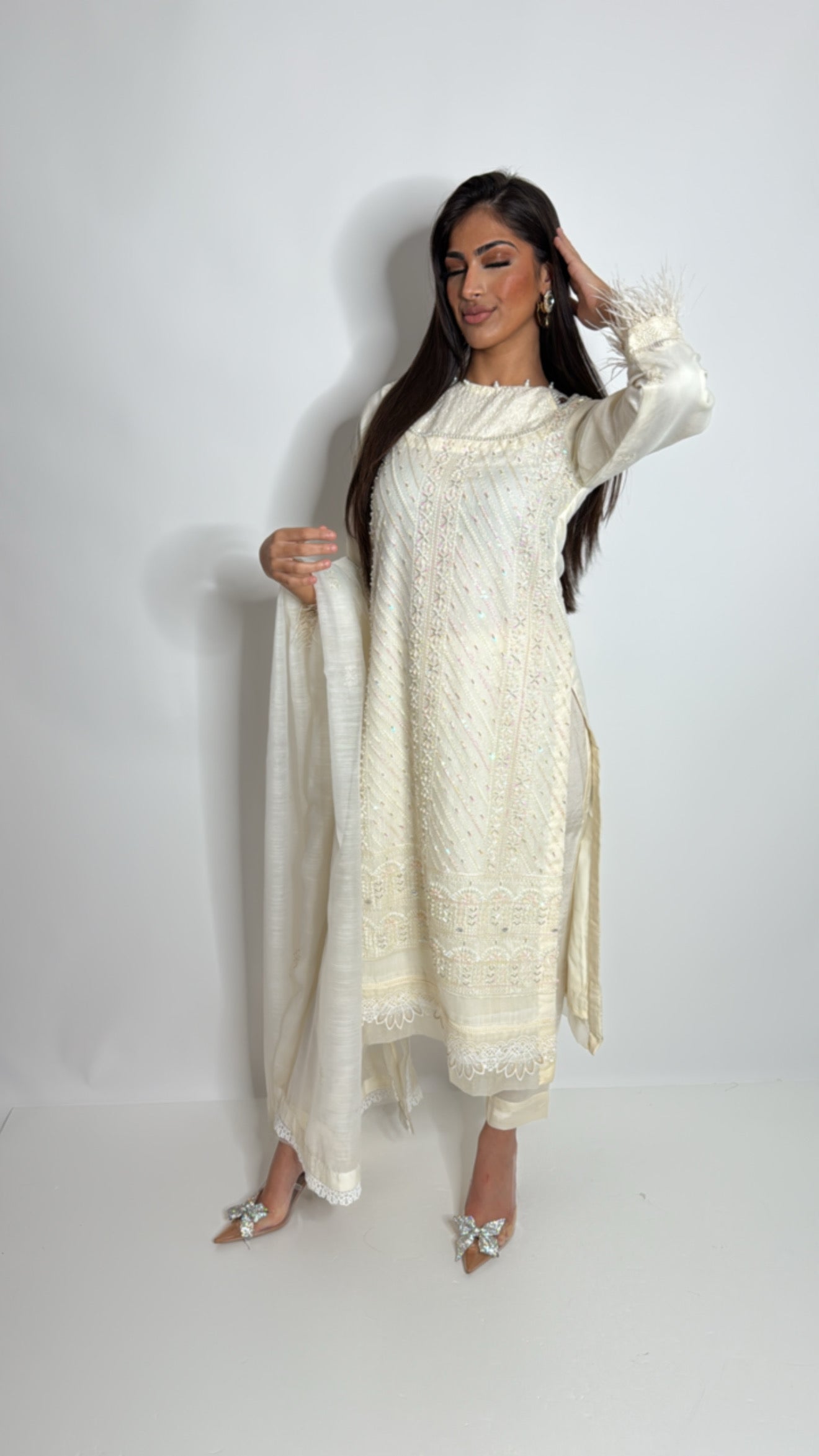 Elegant neckline detail on khaki net embroidered kameez.