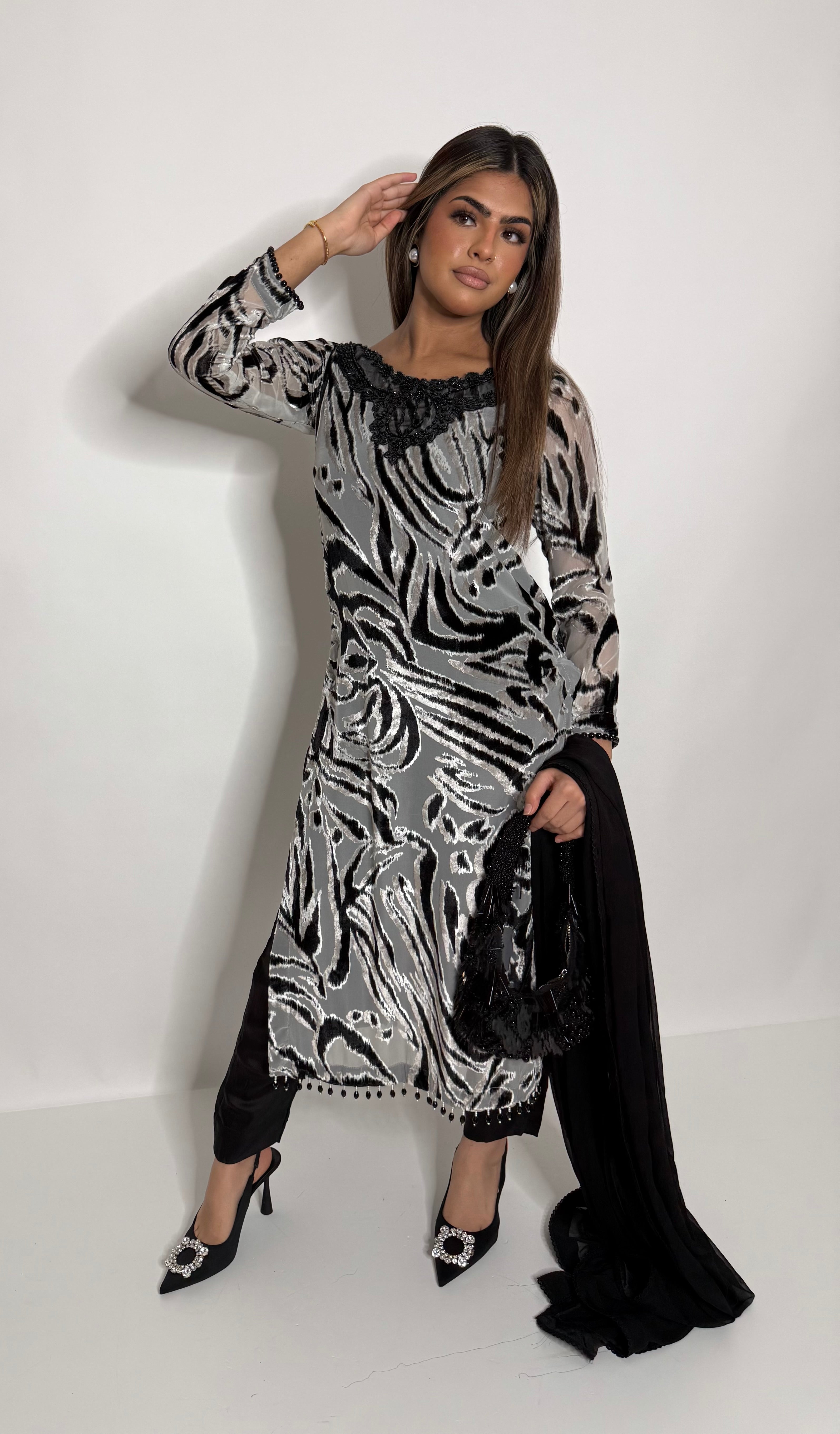 Silk trousers paired with palachi long kameez