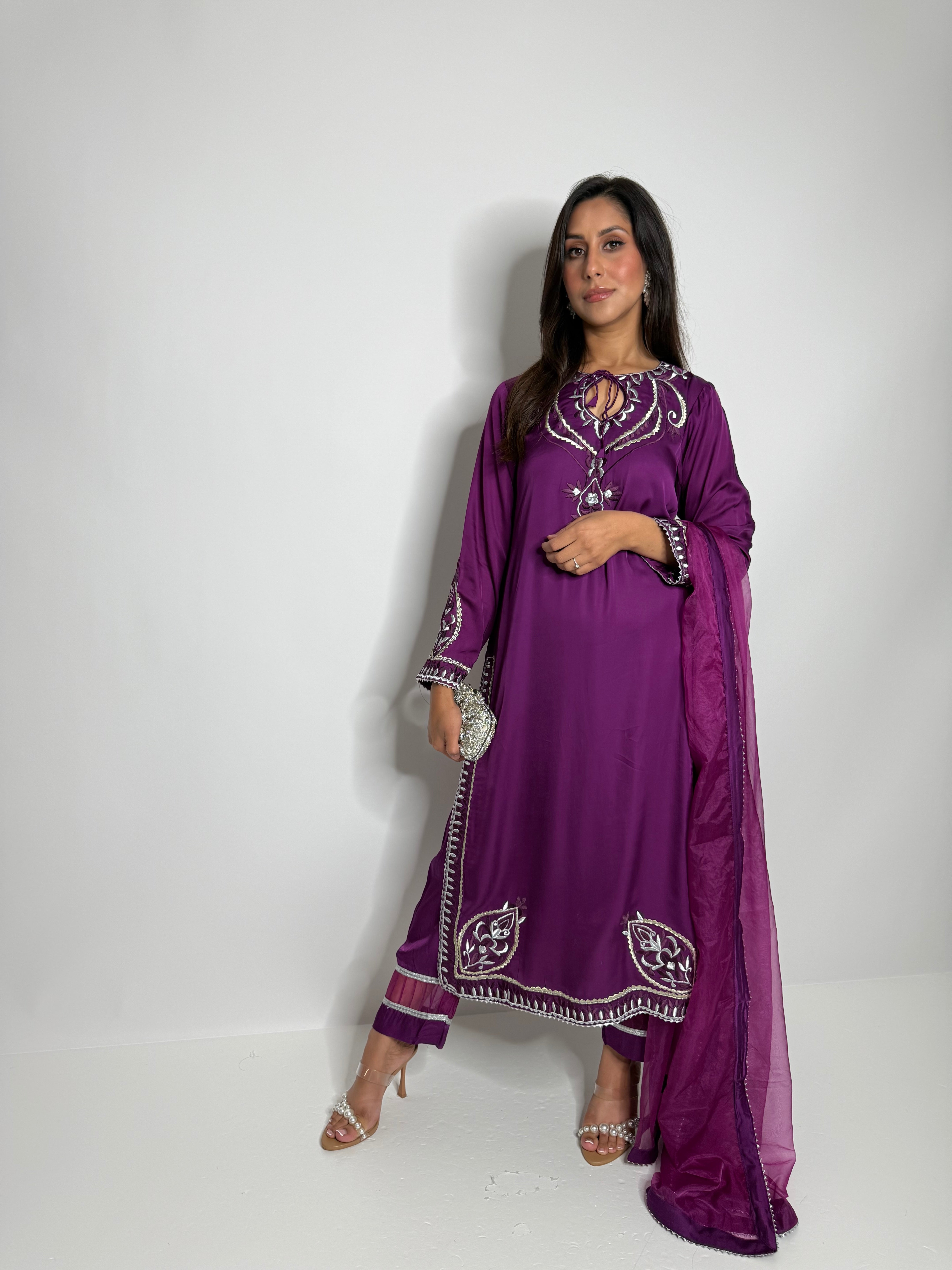 Plum silk neckline thread embroidery detail