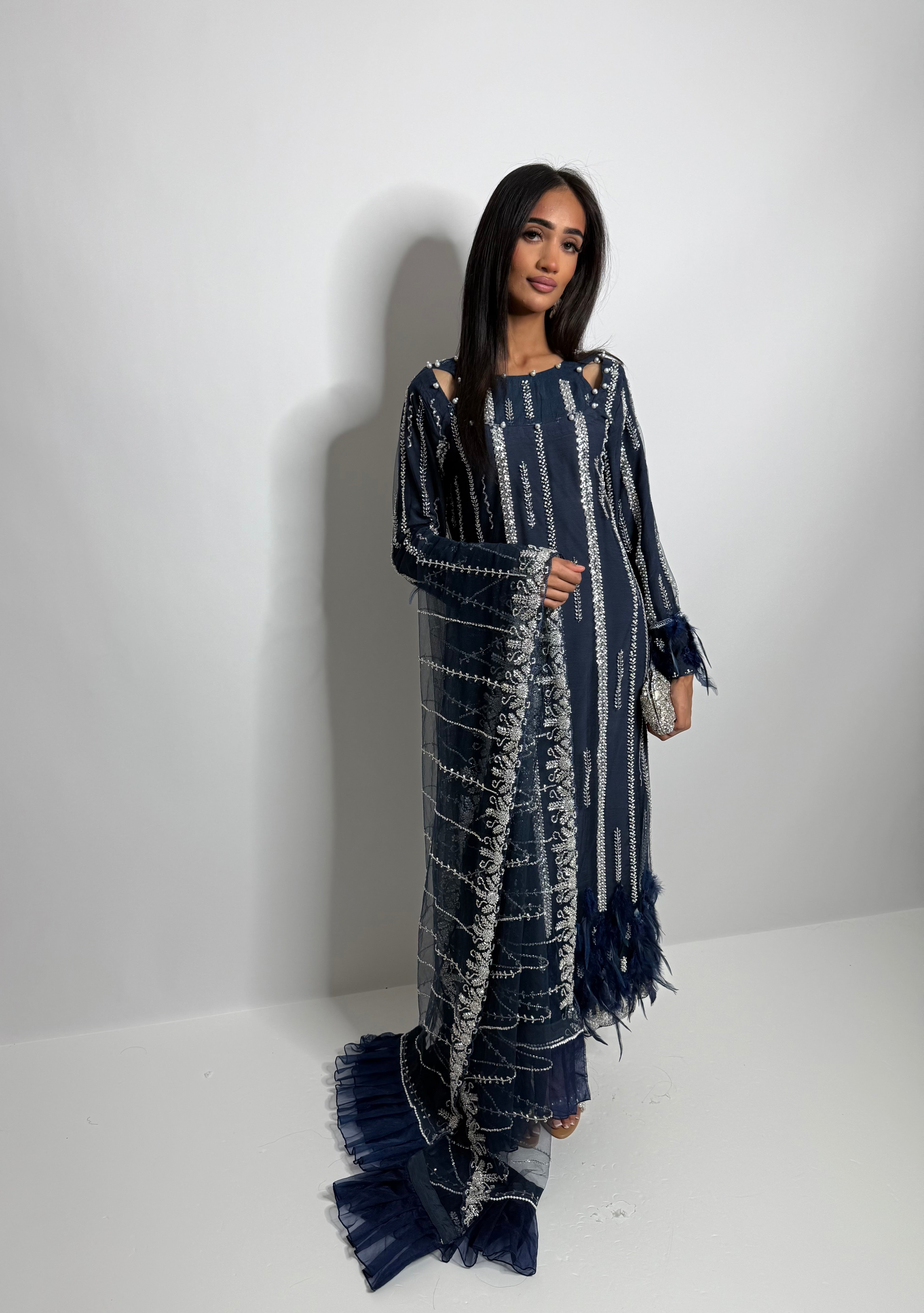 Statement navy Pakistani suit for wedding guest and dawat styling.