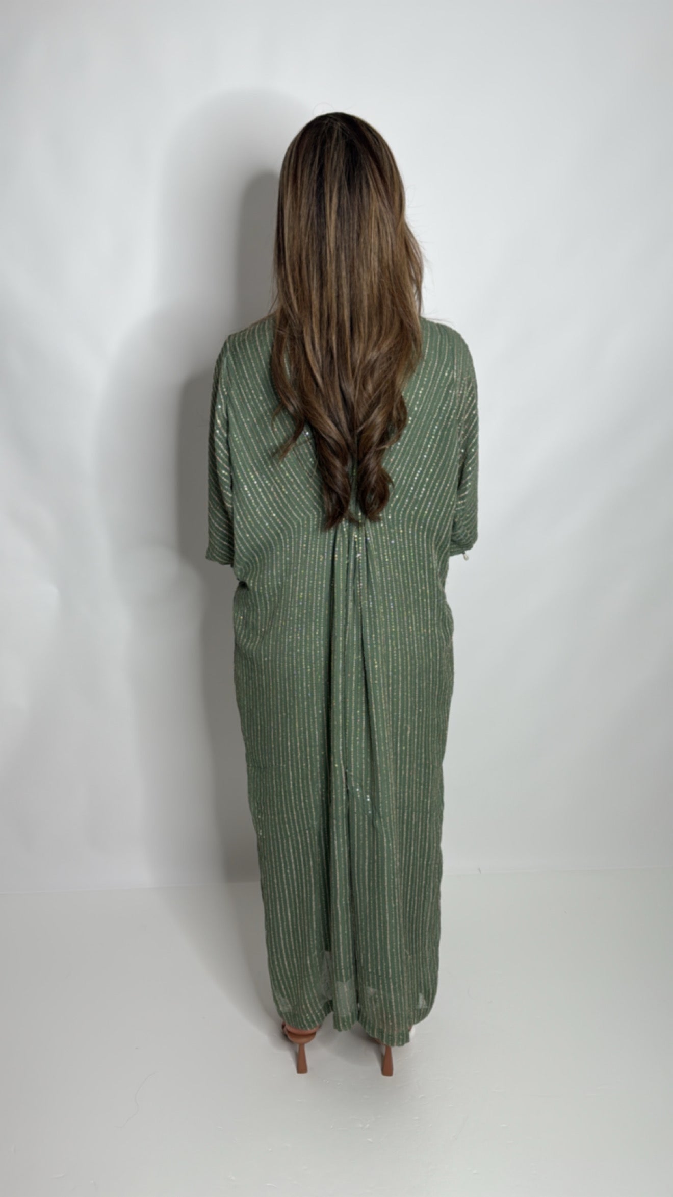Elegant sage Pakistani kaftan set for Eid and summer occasions.