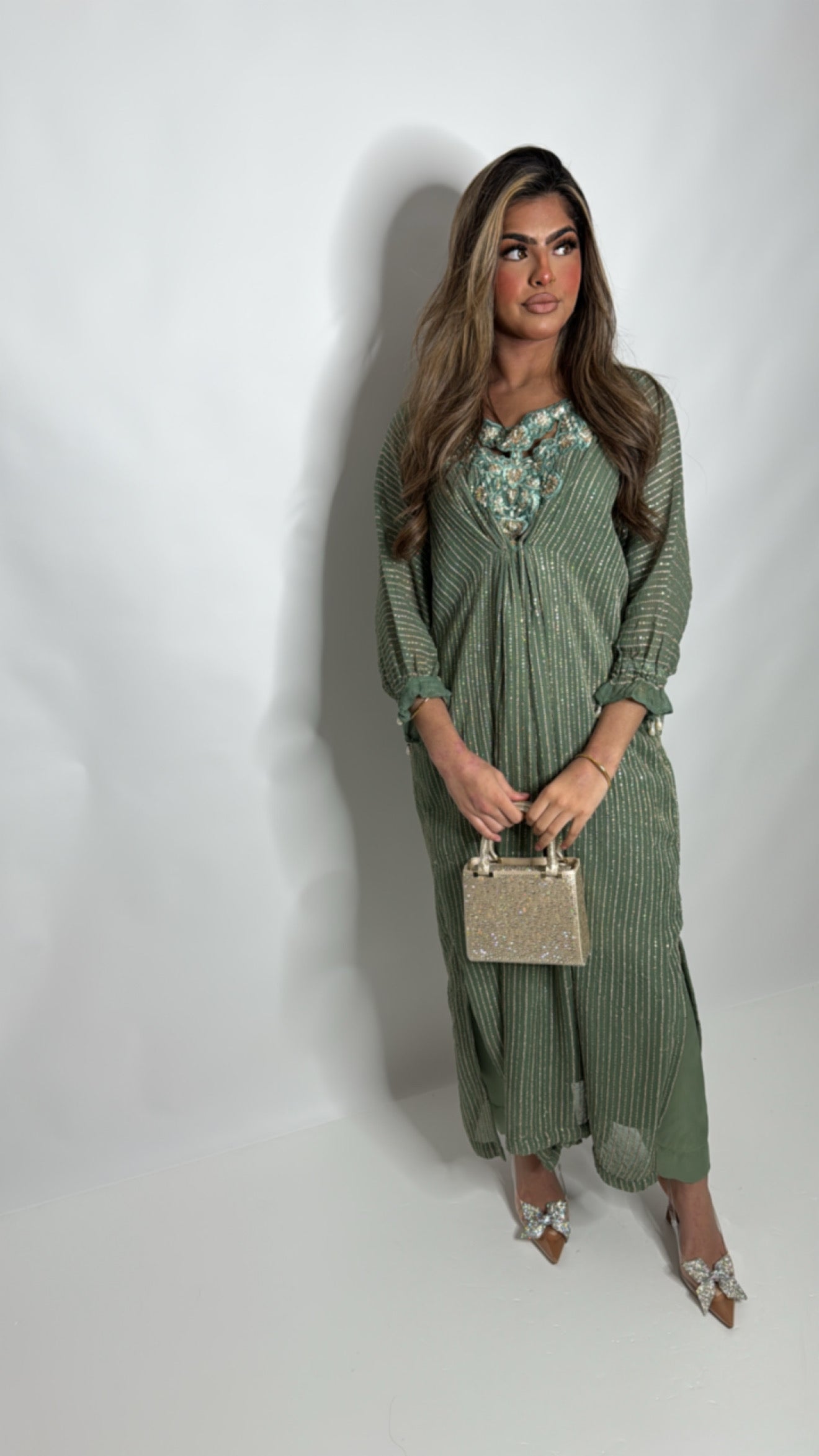 Full length sage green embroidered kaftan UK with flowing silhouette.